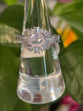 Silver Halo Ring with Pink Oval Center and Clear Accents